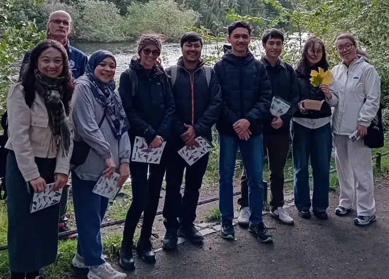 Group photo of students and Chris, wellbeing adviser, on October nature walk