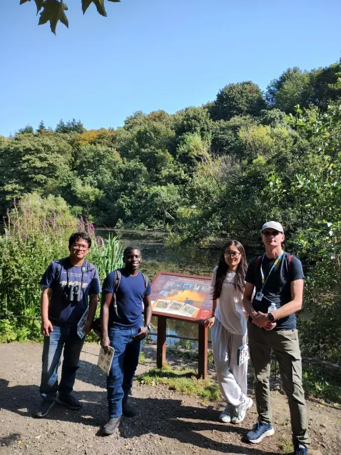 Group photo of students and Chris, wellbeing adviser, on August nature walk