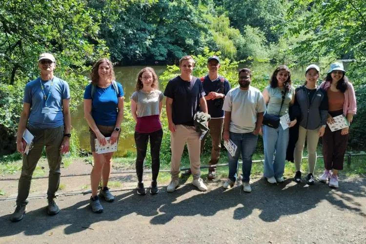 Group photo of students and Chris, wellbeing adviser, on June nature walk