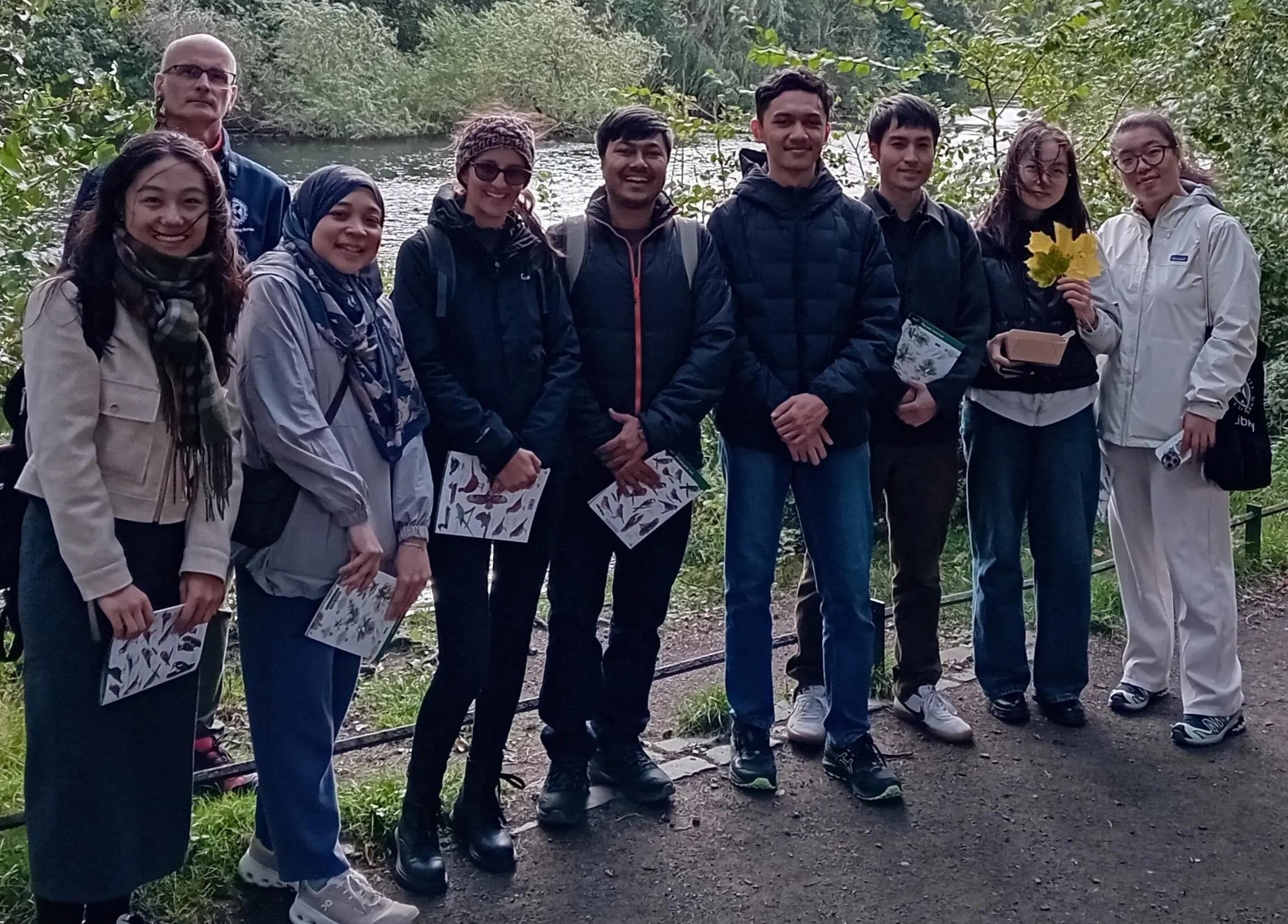 Group photo of students and Chris, wellbeing adviser, on October nature walk